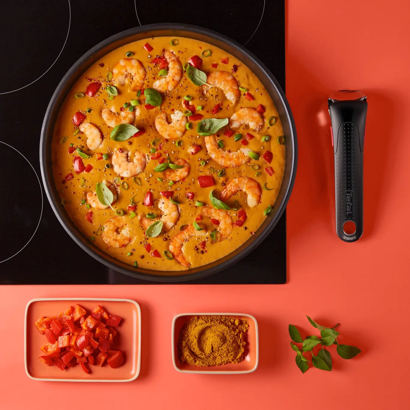 Sartén Ingenio con curry de langostinos sobre placa de inducción